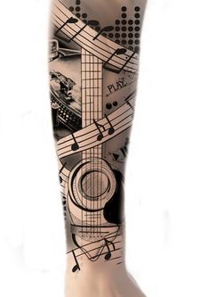 a man's leg with musical notes and guitar on it