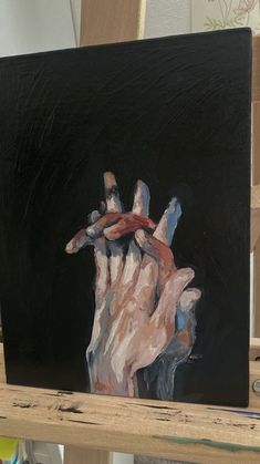 a painting of a person's hand holding something