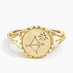 Sagittarius Zodiac Diamond Signet Ring - 14K Yellow Gold. An embossed centaur and a starlike diamond empower this signet and its wearer with the characteristics of the Zodiac fire sign Sagittarius - free-spirited, adventurous, spontaneous. 
 
 An impression in the symbolic shape of the Sagittarius sign is carved into the textured back side of the signet itself, while a shimmering constellation is formed with diamonds along either side of the design. 

Sol is a collection that invites you to embr Fire Sign Sagittarius, Sagittarius Jewelry, Sagittarius Sign, Diamond Signet Ring, Sagittarius Zodiac, Zodiac Sagittarius, Free Spirited, Jewellery Designs, Signet Ring