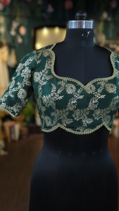 Elegant Cotton Silk Fitted Choli, Elegant Fitted Cotton Silk Choli, Elegant Raw Silk Blouse With Self Design, Green Unstitched Brocade Blouse Piece, Elegant Brocade Tops With Zari Work, Green Brocade Unstitched Blouse Piece, Brocade Top For Wedding, Elegant Brocade Blouse For Party, Elegant Brocade Tops For Festive Occasions