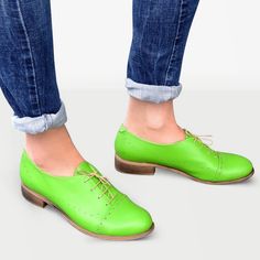 Leather; upper & lining Man-made sole 2.5 cm / 1.0" heel height Handcrafted in Europe Materials: A celebration of bright spring colours, these oxford shoes are built with a slim silhouette design and classic punched detailing. Wear these lace-ups with everything from tailoring to dresses to add a dose of androgynous cool. Material: Tropic Green Soft Leather Laces: Beige & Orange (bonus) Decorations: Brogues, Perforations Sole: Beige #1685 CUSTOMIZEBANNER460991377_ Green Oxford Shoes, Green Shoes Women, Spring Colours, Custom Made Shoes, Oxford Boots, Green Soft, Bright Spring, Green Shoes, Silhouette Design