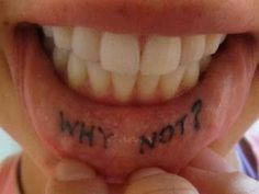 a close up of a child's mouth with the words why not? written on it