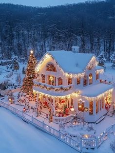 a large house covered in christmas lights