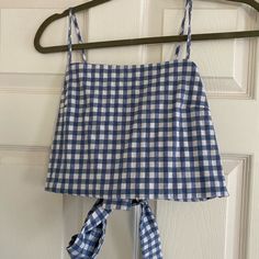 Gingham Patterned Tie Crop Top - Never Worn Blue Cotton Tops With Tie Straps, Summer Gingham Tops With Tie Straps, Blue Cotton Tops With Tie Back, Blue Summer Tops For Picnic, Blue Summer Top For Picnic, Blue Cotton Top For Picnic, Brandy Melville Graphic Tees, Brandy Melville Shirts, Tops Brandy Melville