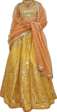 Yellow And Peach Foil Work Lehenga Set Studio Iris - Fabilicious Fashion Yellow Chanderi Dress With Mirror Work, Traditional Orange Organza Choli, Bollywood Style Orange Organza Choli, Anarkali Orange Organza Lehenga, Orange Anarkali Lehenga In Organza, Festive Orange Organza Choli, Gold Chanderi Lehenga With Mirror Work, Yellow Mirror Work Sets In Dola Silk, Gold Lehenga With Mirror Work In Georgette