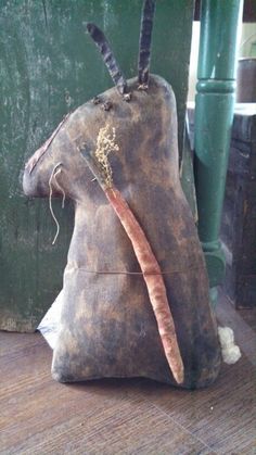 an old bag with a carrot sticking out of it