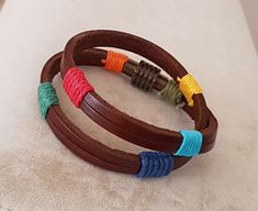 "B R A C E L E T ∙ D E T A I L S - Custom leather bracelet - Hand made - Hook type clasp H O W ∙ T O ∙ O R D E R -Add item to shopping cart -Then add personalization to the \"notes\" section during checkout. ORDERING THIS BRACELET AS A GIFT? -The average women's wrist size is 6.5 inches. -The average men wrist size is 7.5 inches. W R I S T ∙ S I Z E :(please view the photo showing how to take your wrist size) -Please measure your wrist carefully and choose your actual wrist size. -Please do not add extra room when measuring! -Wrist size is wrist measurement. Not bracelet size. -We'll add just the right amount of additional length to make it fit. C A R E ∙ F O R ∙ Y O U R ∙ J E W E L R Y -Keep dry. -Remove when going to shower, sleep, pool, beach or spa -Never use chemical jewelry cleaners Brown Leather Wrap Bracelet As Gift, Brown Leather Wrap Bracelet Gift, Brown Leather Wrap Bracelet For Gift, Brown Leather Strap Wrap Bracelet Gift, Multicolor Leather Bracelets As A Gift, Casual Multicolor Leather Bracelet As Gift, Casual Multicolor Leather Bracelet As A Gift, Casual Multicolor Leather Bracelet For Gift, Handmade Brown Leather Friendship Bracelet