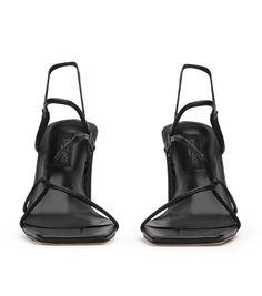 A wardrobe staple by all means, the Calais mules are set to be on a sure favourite this season. These strappy heels feature a squared toe-shape, foot-framing cross-foot straps and is finished with a 8.5cm heel height. Pair back with almost any outfit for the perfect finishing touch. -Material: Genuine Leather -Sole: Man-made -Fit: True to size -Toe-shape: Squared -Features: Strappy Upper -Heel: 8.5cm Thrift List, Thigh High Boots Flat, Court Heels, Bridal Heels, Black Strappy Heels, Slingback Shoes, Boots Knee, Flat Boots, Ballet Flat Shoes