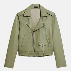 This women's leather jacket is crafted from 100% genuine lambskin leather that is both soft and durable. The green color of this jacket is unique and will add a pop of color to your outfits. It features a classic biker-style design, with an asymmetrical front zipper, a belted waist, and zippered cuffs. The jacket also has two zippered pockets on the front and one on the inside, providing ample storage for your belongings. Material: 100% genuine lambskin leather Color: Green Style: Biker Closure: Womens Leather Biker Jacket, Green Leather Jacket, Leather Shorts Women, Short Leather Skirts, Green Leather Jackets, Studded Jacket, Distressed Jacket, Sheepskin Jacket, Western Jacket