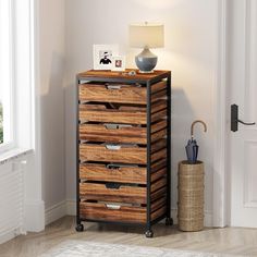 a wooden chest with drawers in a room