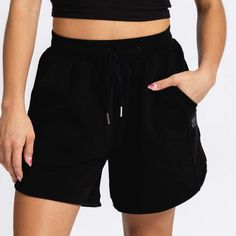 Embrace comfort and style with our Women's Reset Short. Made from soft, cozy fabric, these shorts feature a relaxed fit and an adjustable waistband for ultimate ease. Perfect for lounging at home or casual outings, these versatile shorts are a go-to for laid-back days. Tri Suit, Running Sports Bra, Women's Cycling Jersey, Sport Bra Top, Cozy Fabric, Back Day, Swim Caps, Cycling Women, Adjustable Waistband