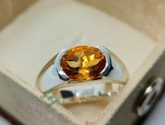 Band : Goldsmith jaipur  Material : 925 Sterling Silver Gemstone : 100% Natural Citrine Citrine Stone size : 2.50mm Stone Wight : 1.43Ct Stone Shape : Emerald  Stone Color : Yellow Ring Size : All Size Available   All of our jewelry is handmade with great care by our team. Thank you for visiting our store. https://www.etsy.com/your/shops/Goldsmithjaipur/tools/listings/stats:true/1356025660 Yellow Ring, Yellow Rings, Emerald Cut Rings, Citrine Stone, Natural Citrine, November Birthstone, Citrine Gemstone, Emerald Stone, Oval Stone