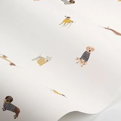 a wallpaper with dogs and people in striped shirts on it's side,