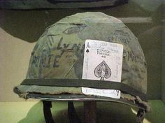 an old helmet with some writing on it