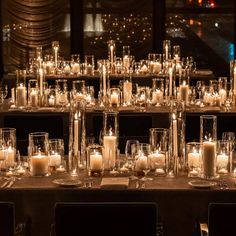 a long table with candles on it