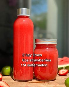 two red watermelon juices sitting next to each other on a cutting board