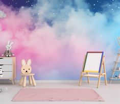 a child's room decorated in pastel colors with clouds and stars on the wall