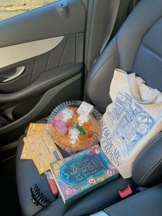 the back seat of a car filled with items