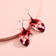 This Unique Pair Is A Wonderful Addition To Your Costume; Great For A Gory Get Up Like A Zombie Costume Or A Surgeon Etc. Sure To Cause A Freight! Fun Accessory For A Fun Halloween Party Or A Zombie Walk Event! Grwmvs00f0000u4 Trendy Red Halloween Jewelry, Trendy Red Jewelry For Halloween, Heart-shaped Halloween Party Earrings, Halloween Party Heart-shaped Earrings, Red Heart-shaped Novelty Jewelry, Sekijiro Kan, Barrel Costume, Zombie Earrings, Aaron Lycan