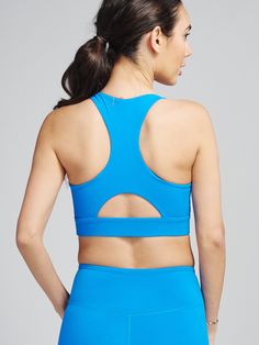 Sculptive Upbeat Sports Bra tasc Performance (AdventureBlue) Supportive Sports Bra With Built-in Padding For Light Sports, High Stretch Blue Sports Bra For Light Sports, High Stretch Blue Sports Bra With Moisture-wicking, Blue High Stretch Sports Bra With Moisture-wicking, Blue Compressive Activewear With Built-in Padding, Blue High Stretch Moisture-wicking Sports Bra, Blue Moisture-wicking High Stretch Sports Bra, High Stretch Blue Sports Bra For Sports, High Stretch Breathable Blue Sports Bra