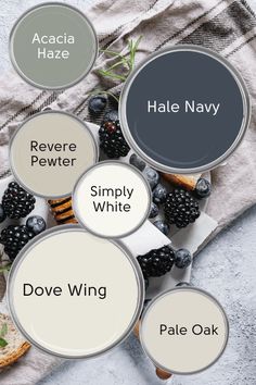 four different shades of white paint with blackberries and berries on the bottom one is labeled hale navy, revere pewer, simply white, dove wing, pale oak