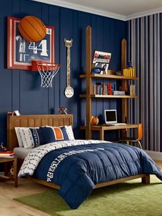 a bedroom decorated in blue and orange with a basketball on the wall