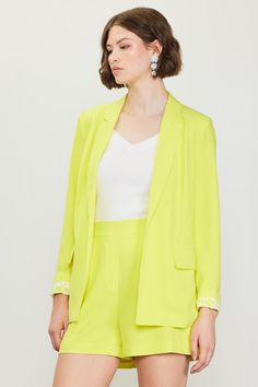 The Top Notch Boyfriend Blazer in yellow?! A statement piece for spring. This fit? A CLASSIC. It has so many great details like working pockets, straight sleeves and a notched collar. Blazers are always sooo chic and this one has the perfect cool girl touch. -Relaxed fit blazer-- straight,, easy fit-Longer length hits at just the right spot-Curved lapel-Open style front-- tres chic-Small shoulder pads for structure-Full length-Fully lined and delicious quality XSmall: 2-4, Small: 4-6, Medium: 8- Spring Blazer With Lapel Collar For Work, Spring Workwear Blazer With Lapel Collar, Spring Single Breasted Blazer For Work, Spring Single-breasted Blazer For Workwear, Single-breasted Blazer For Spring Workwear, Single-breasted Spring Workwear Blazer, Single Breasted Blazer For Spring Workwear, Green Spring Blazer For Business Casual, Spring Green Blazer For Business Casual