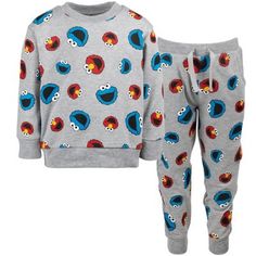 Can you tell me how to get to Sesame Street? Dress your little one in this adorable Sesame Street Sweatshirt & Pants and watch them learn and play with Elmo, Cookie Monster, Big Bird, Grover, Oscar the Grouch, Abby Cadabby, Bert and Ernie and the rest of their monster friends. Your child will love to wear this cute and stylish long sleeve graphic sweatshirt and cute, comfy and stylish pants featuring their favorite loveable Muppets. Elmo And Cookie Monster, Sesame Street Elmo, Jogger Pants Outfit, Sesame Street Cookie Monster, Style Sweatpants, Street Sweatshirt, Stylish Pants, Soft Clothes, Kids Clothes Boys