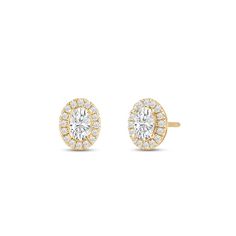 Classic oval cut earrings with a stunning halo of round stones encircling the center stone.A lovely outfit-maker, this pair of stud earrings is what you need to give any ensemble a polished, put-together finish Diamond Halo Earrings, Halo Diamond Earrings, Cut Earrings, Gorgeous Engagement Ring, Halo Earrings, Outfit Maker, Diamond Halo, Oval Diamond, Conflict Free Diamonds