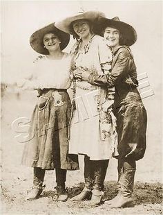 This stunning canvas art features three classic rodeo cowgirls from the 1920s in a vintage Western setting. Measuring at a large 13" x 19", this art print is perfect for any fan of Western or vintage photo art. The print is made using a Giclee & Iris Print production technique, ensuring high-quality and long-lasting colors. The canvas art is unframed, and the piece is an open edition print. This artwork reproduction is perfect for both home decor and collectors. The piece is listed by a dealer Women In Hats, Cowgirl Vintage, Cowgirl Photo, Wilde Westen, Rodeo Cowgirl, Into The West, Cowboy Girl, Cowgirl Art, Three Women