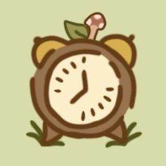 an alarm clock sitting in the grass with a leaf on it's back end