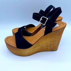 Stylish And Versatile, Steve Madden Celeste Wedge Heels. Black Buckle Straps Combine With A Wood Grain Platform Heel For A Classic Look. Never Worn (See Pics Of Soles) Excellent Condition. Shoes Steve Madden, Platform Heel, Heels Black, A Wood, Platform Heels, Wedge Heels, Classic Looks, Wood Grain, Steve Madden