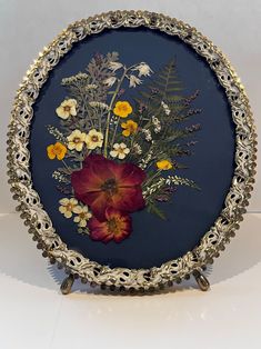 a metal frame with flowers on it