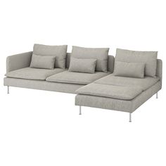 a gray couch with pillows on it and some metal legs in front of white background