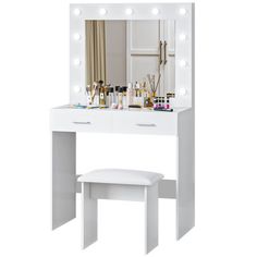 a white vanity with lights and stool