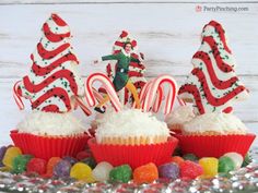 some cupcakes and candy on a table