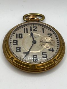 Up for your consideration is an antique Elgin Model 6 pocket watch built 124 years ago in 1900. This is a 17 jewel, size 16s manual wind pocket watch with a silver dial in a fantastic Art Deco gold filled case. It is currently running well and keeps time to within about a minute a day.  Anyone can buy an Apple watch, not many can say they wear a piece of history. Fantastic Art, Cool Watches, Pocket Watch, Apple Watch, Art Deco, Electronic Accessories, Music Clothes