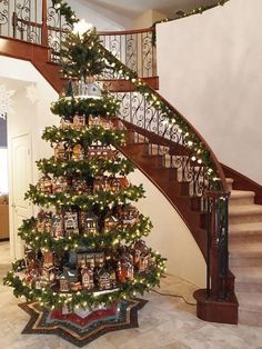 a christmas tree in the middle of a staircase