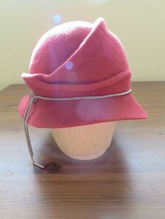 "This floppy brimmed cloche is hand blocked by me in my studio. The softness of the velour fur felt is luxurious and warm. The hat is trimmed with a silver color metal headband and lined with polka-dot lining.  The head-size is 21 3/4\". Thanks for looking! To measure the size of your head to ensure a proper fit, do the following: * Measure circumference of head (in inches) by wrapping a tape measure gently around your head right above the ears, making sure the tape crosses the midpoint of your Occipital Bone, Twenties Style, Cloche Hats, Beige Hat, Green Fur, Metal Headband, Fall Hats, Pink Fur, Metal Headbands