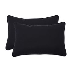 two black pillows sitting next to each other