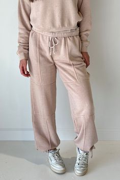 A must have pair of sweatpants to wear all year long! Our new Lounge Life Joggers feature an elastic tie waistband, seam detailing, drawstring bottoms, and side pockets. The perfect bottoms to just throw on and go! cotton polyester hand wash with cold water lay flat to dry do not iron Model is wearing a size small Trends 2025, Tailgate Outfit, Relaxed Trousers, Pink Lemon, Tank Bodysuit, Easy To Love, Midi Maxi Dress, Fall Fashion Trends, Love Hair