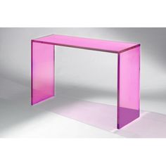 a pink console table sitting on top of a white floor