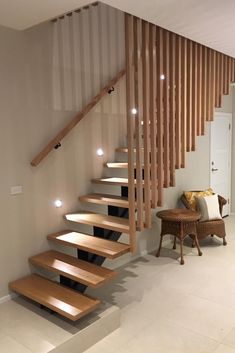 there is a wooden stair case in the house