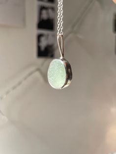 Handmade sterling silver Sea Glass necklace, made with recycled silver, and genuine Sea Glass from the Jurassic Coast. This necklace has one large piece of light blue Sea Glass, and is very dainty and elegant.  This necklace is a perfect gift for a special occasion, and is perfect for Sea Glass lovers! The chain is 18" (45cm), and has an easy closure. All of the silver on the necklace is 925 Sterling Silver, including the chain and small jump rings! Feel free to message me for any additional information, or for commissions/custom requests! Handmade Silver Necklace With Recycled Glass, Handmade Silver Recycled Glass Necklace, Silver Recycled Glass Necklace For Gift, Nickel-free Silver Necklaces Made Of Recycled Glass, Nickel-free Silver Necklaces With Recycled Glass, Round Sea Glass Jewelry Gift, Nickel-free Silver Necklace Of Recycled Glass, Nickel Free Silver Necklace Of Recycled Glass, Minimalist Recycled Glass Necklaces For Gifts