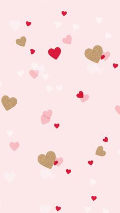 hearts are flying in the air with gold and red confetti around them on a pink background