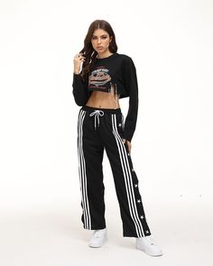 Details: Long track pants with star graphical design and drawstring details Bottom Length: Long Materials: 95% Polyester + 5% Spandex Aesthetic Track, Trendy Flare Jeans, Kitsch Fashion, Y2k Grunge Aesthetic, Graphical Design, Y2k Fashion Aesthetic, Argyle Vest, Vintage 90s Style, Clueless Fashion