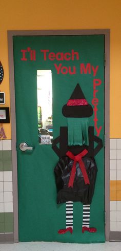 a classroom door decorated to look like an elf