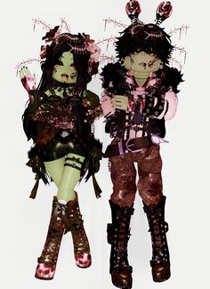 two women dressed up as zombies standing next to each other in front of a white background