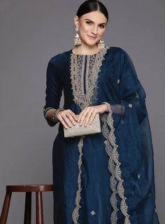 Salwar Kameez Set/Dresses For Women/Indian Wedding Dress/Pakistani Suit/ Kurta Palazzo Set / Kurtis for Women/ Gift for Women / Anarkali Style Kurta Set Product Details Navy blue yoke design Kurta with Trousers with dupatta Kurta design: * Floral yoke design *Regular style *Straight shape *Round neck, three-quarter regular sleeves *Sequinned detail * Silk blend fabric * Calf length length with straight hem Trousers design:  * Embroidered Trousers * Slip-on closure * Elasticated waistband Material & Care Silk Blend, Gentle Hand Wash Where-to-wear festive wear items includes One piece Kurta One piece Dupatta One piece Trouser Note:- Please see the size chart in the image to choose a perfect size. Please feel free to ask any questions regarding this item WE ALSO ACCEPT CUSTOMISATION AS PER CU Navy Blue Kurta Woman, Eid Art Silk Dress With Sheer Dupatta, Eid Sheer Dupatta Art Silk Dress, Elegant Salwar Kameez With Dupatta For Navratri, Dola Silk Kurta With Sheer Dupatta For Party, Festive Semi-stitched Dola Silk Dress, Long Sleeve Dola Silk Dress For Diwali, Transitional Party Salwar Kameez In Chinon, Straight Kurta Dress With Dupatta For Diwali