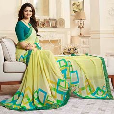 Lemon Yellow colored saree is made from georgette fabric which is highlighted with beautiful printed with lace border work as shown. comes along unstitched art silk (silk blend) blouse which you can customise as per your design/style. Occasion - You can wear this saree for festive and functions. Note:- The actual product may differ slightly in color and design from the one illustrated in the images when compared with computer or mobile screen. Measurements: Saree : Georgette : 5.5 Mtrs Blouse : Green Georgette Blouse Piece With Printed Motifs, Yellow Semi-stitched Blouse Piece With Printed Border, Green Semi-stitched Blouse Piece With Printed Border, Semi-stitched Yellow Blouse Piece With Printed Border, Semi-stitched Green Blouse Piece With Printed Border, Bollywood Style Georgette Digital Prints With Printed Border, Bollywood Style Digital Prints With Printed Border On Georgette, Green Georgette Dupatta With Printed Border, Traditional Green Chiffon Saree